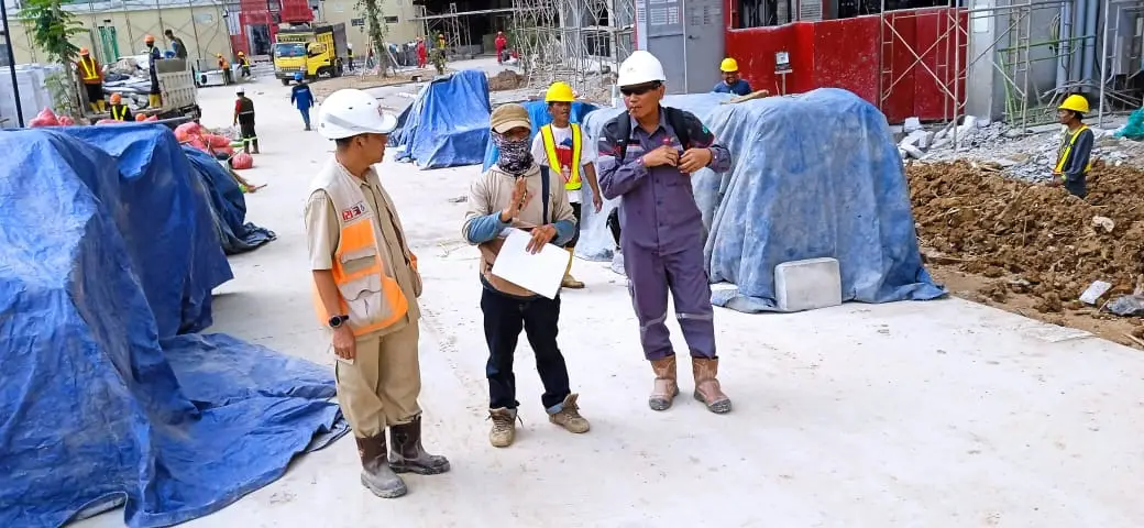 Koordinasi staf proyek
